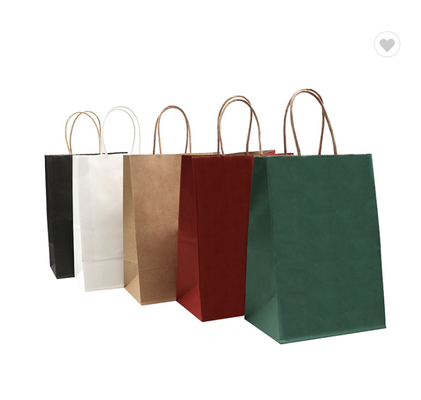 Un buen precio. Bolsas de papel kraft marrón biodegradable con mangos para compras en línea