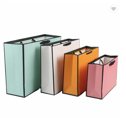 Un buen precio. 2022 Tiendas grandes Bolsas de papel de guseta ancha Bolsas de regalo de papel de colores Pantone en línea
