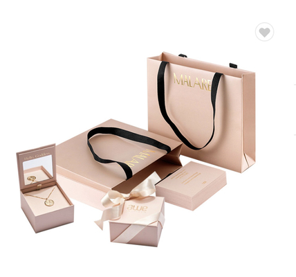 Un buen precio. Pequeña Rosa Rosa CMYK Bolsa de papel de regalo de lujo Portador de embalaje con mangos de cinta 230gsm en línea